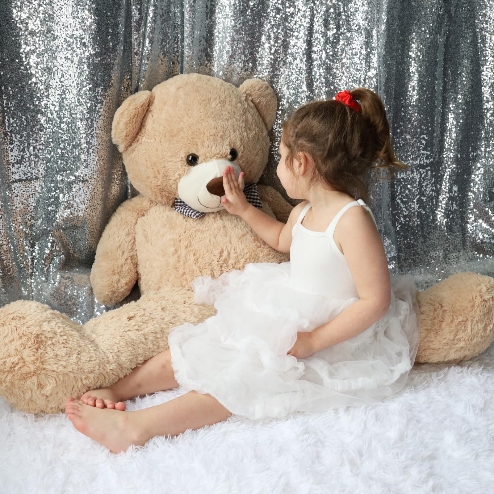 Toys Studio 47 inch bear makes a thoughtful gift for loved ones on special occasions.