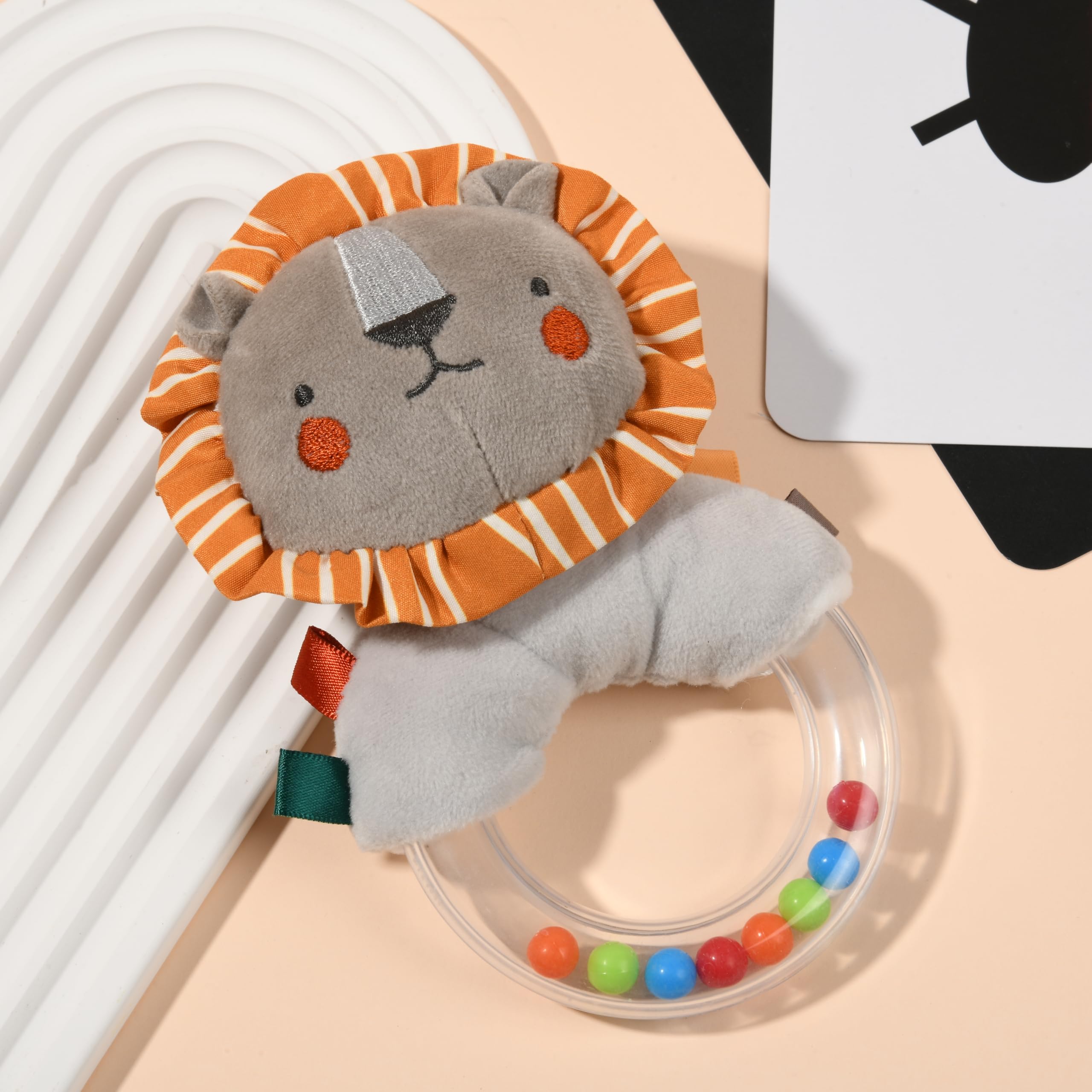 Toyssa color-rich textile drum with mirror encourages exploration