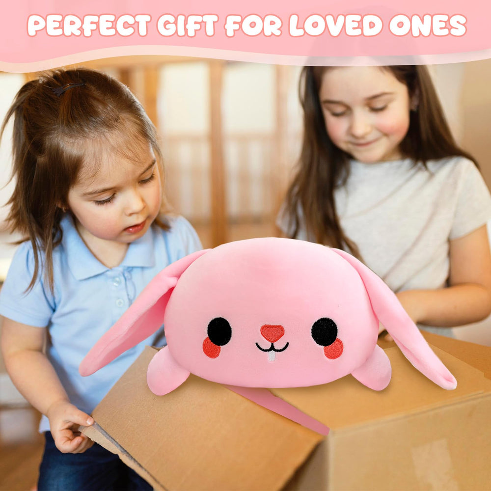 TOYSYM weighted bunny decor pillow adding cute charm to a couch or bed.