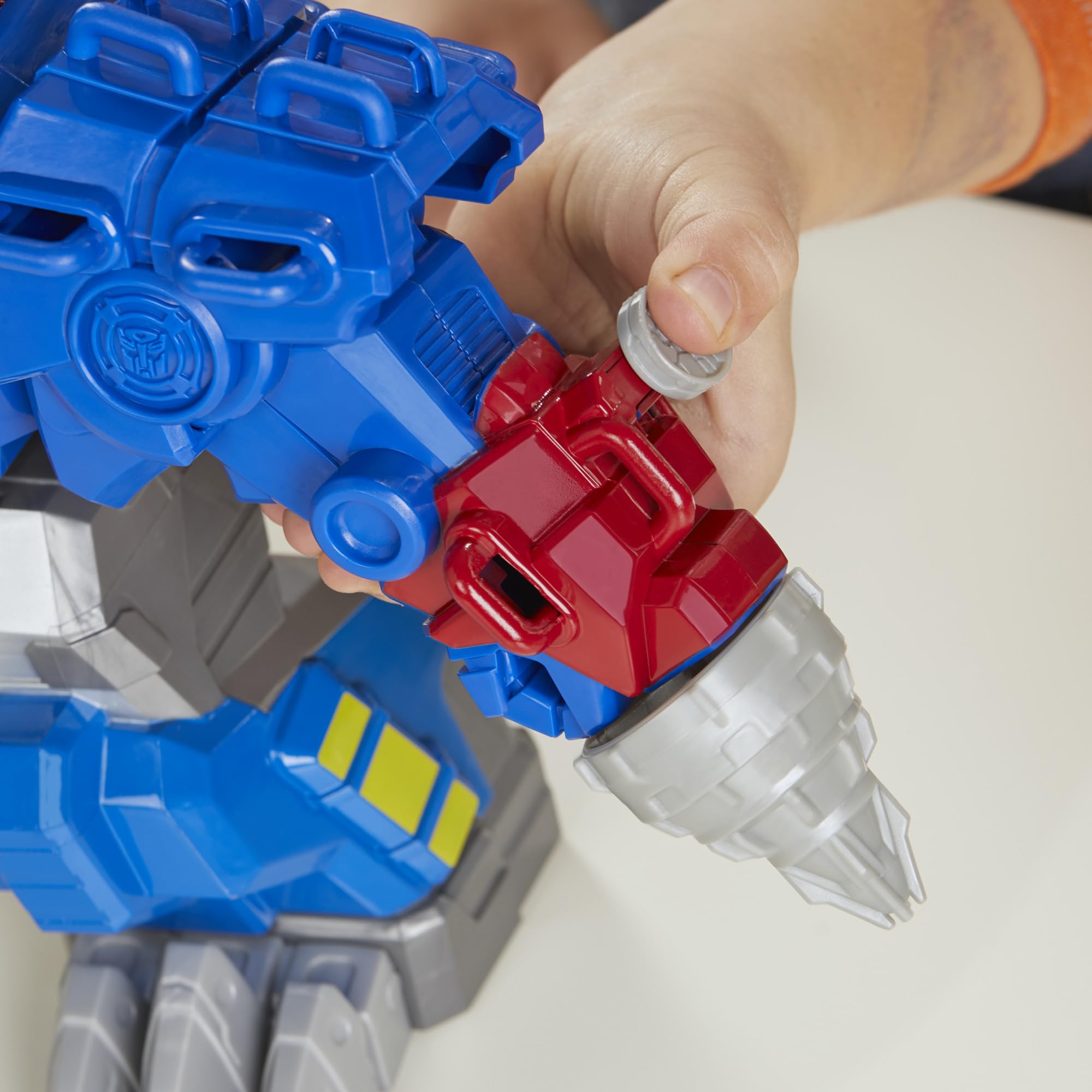 Transformers Dinobot Adventures 9-inch scale Optimus Prime figure for small-handed play.