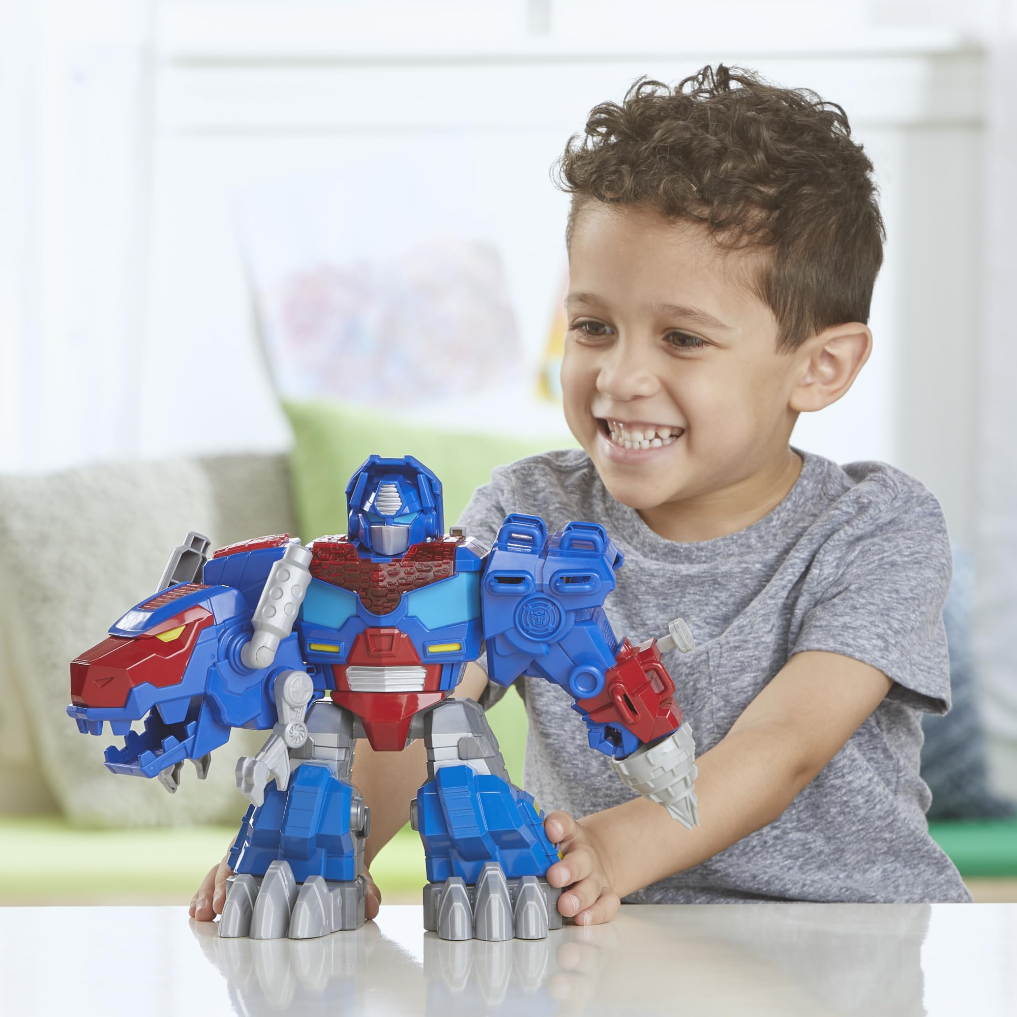 Transformers Dinobot Adventures Optimus Prime lights and sounds for immersive action moments.