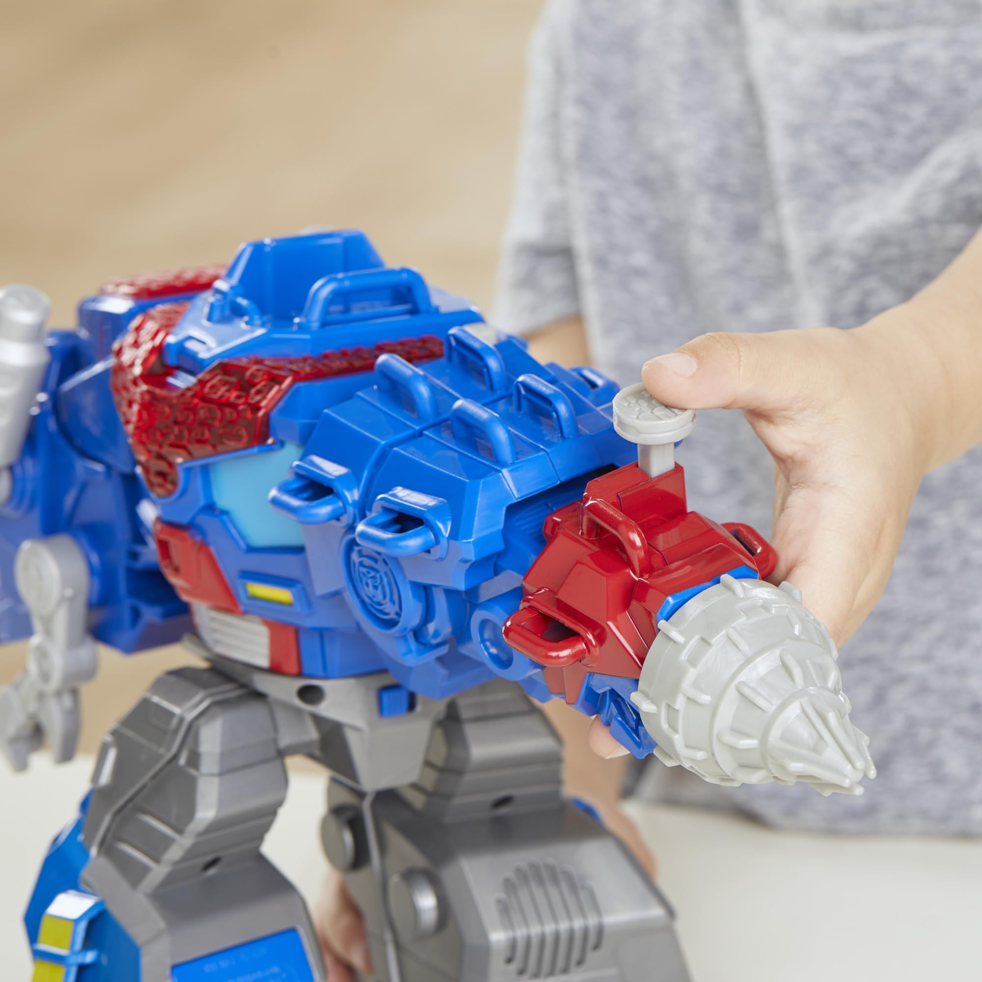 Transformers Dinobot Adventures Optimus Prime T-Rex reveal, highlighting dynamic dinosaur play.