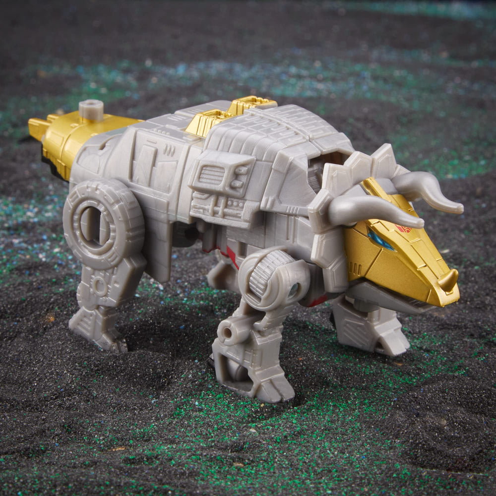 Transformers Dinobot Slug with other Dinobot figures for collection.