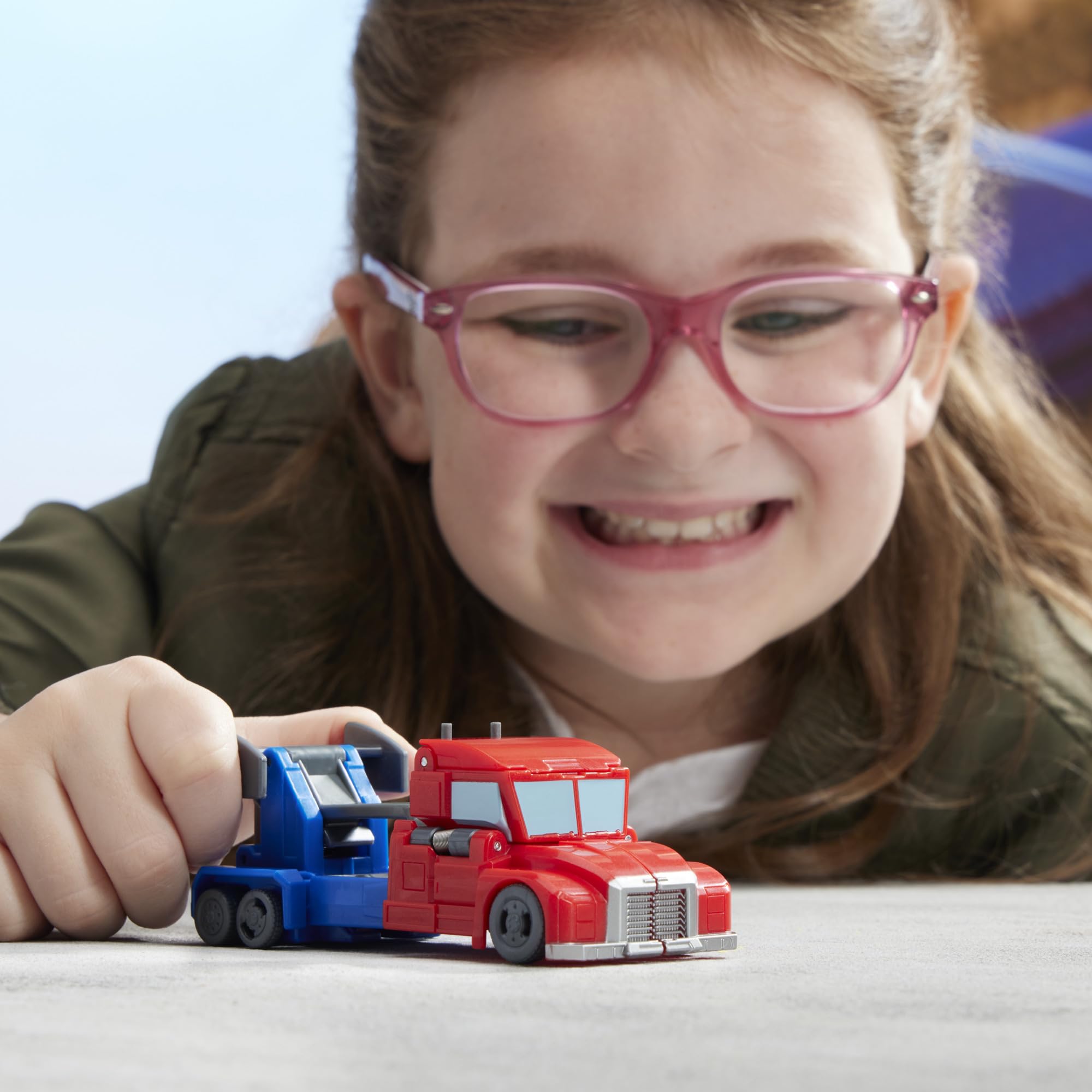 Transformers EarthSpark Optimus Prime inspires kid-friendly transforming play.