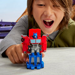 Transformers EarthSpark Optimus Prime stands as a 4-inch robot figure.
