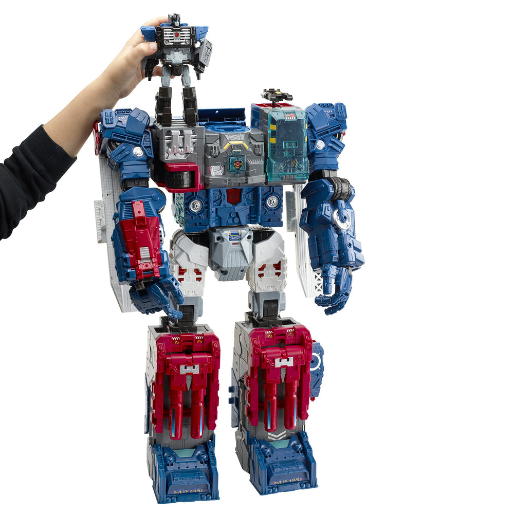 Titan Master Emissary figure as head enables dynamic transformations.
