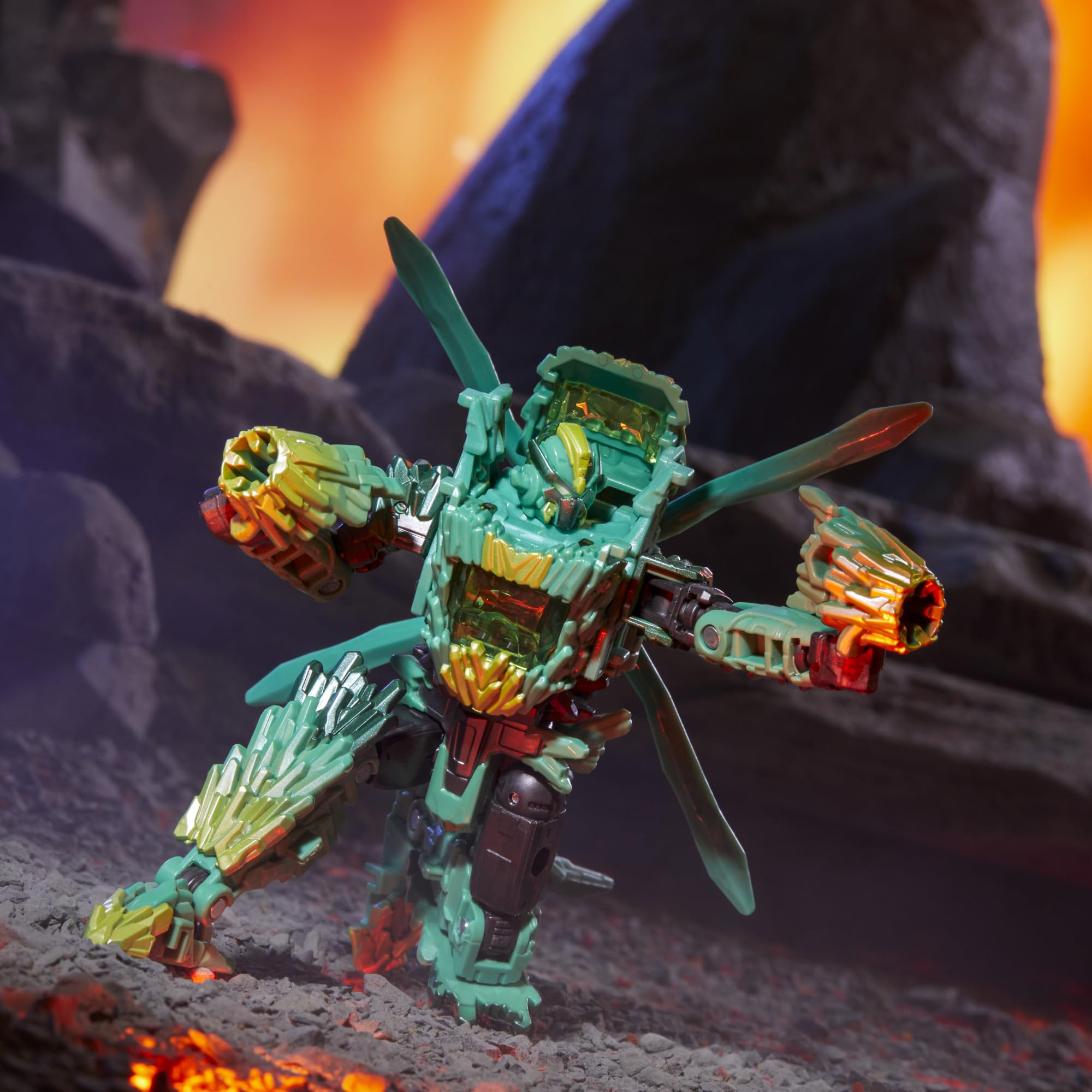 Transformers Infernac Universe Shard blade and blaster accessories included.