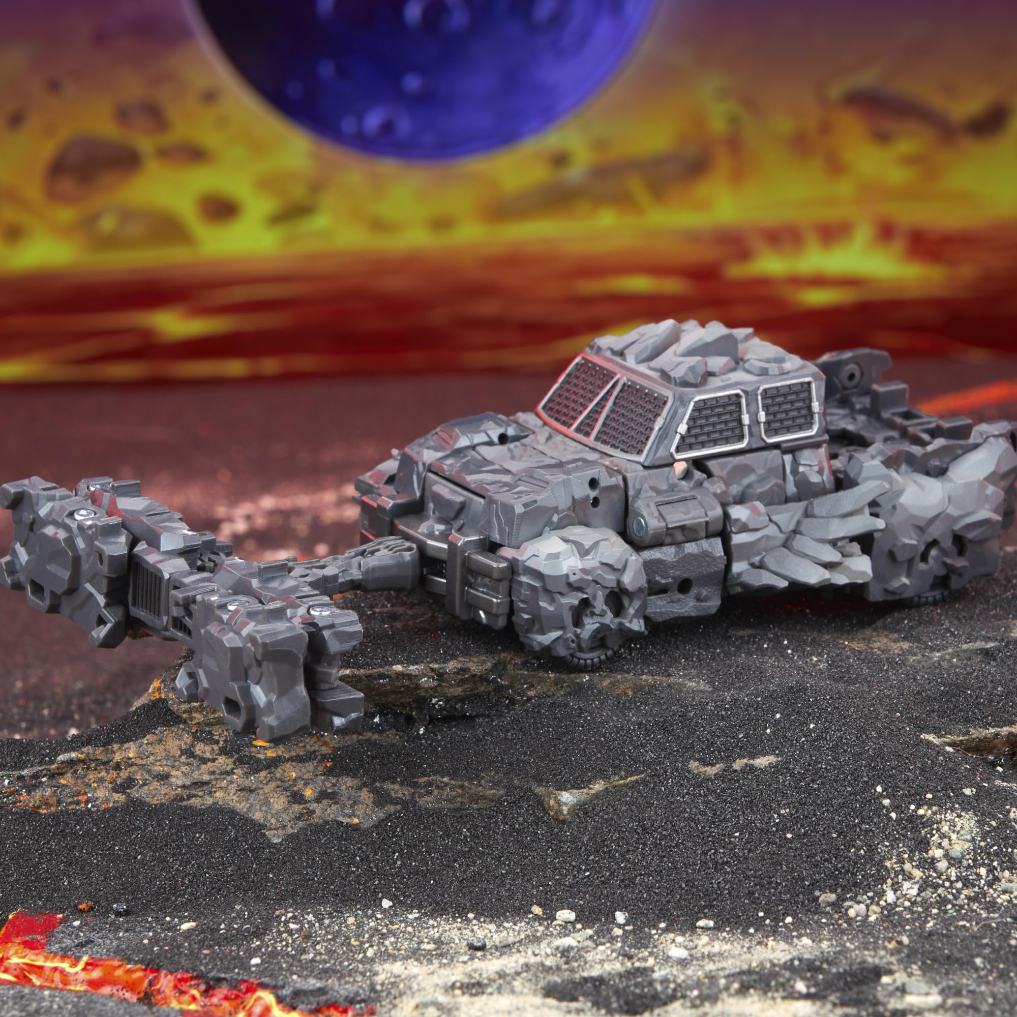 Transformers Magneous rock texture detail enhances collectible appeal.