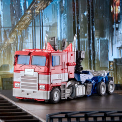 Transformers MPM12 Optimus Prime CAD-inspired sculpt mirrors Bumblebee film.