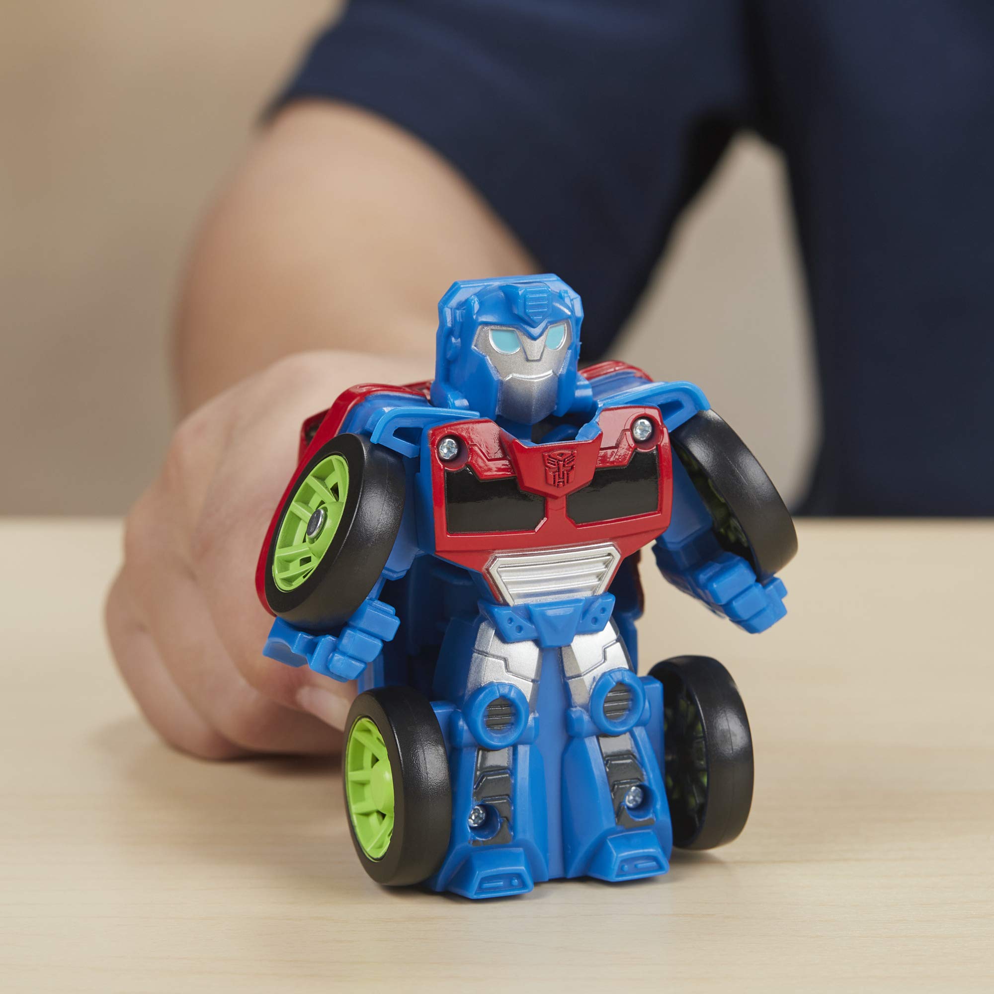 Five collectible figures on a race-ready setup