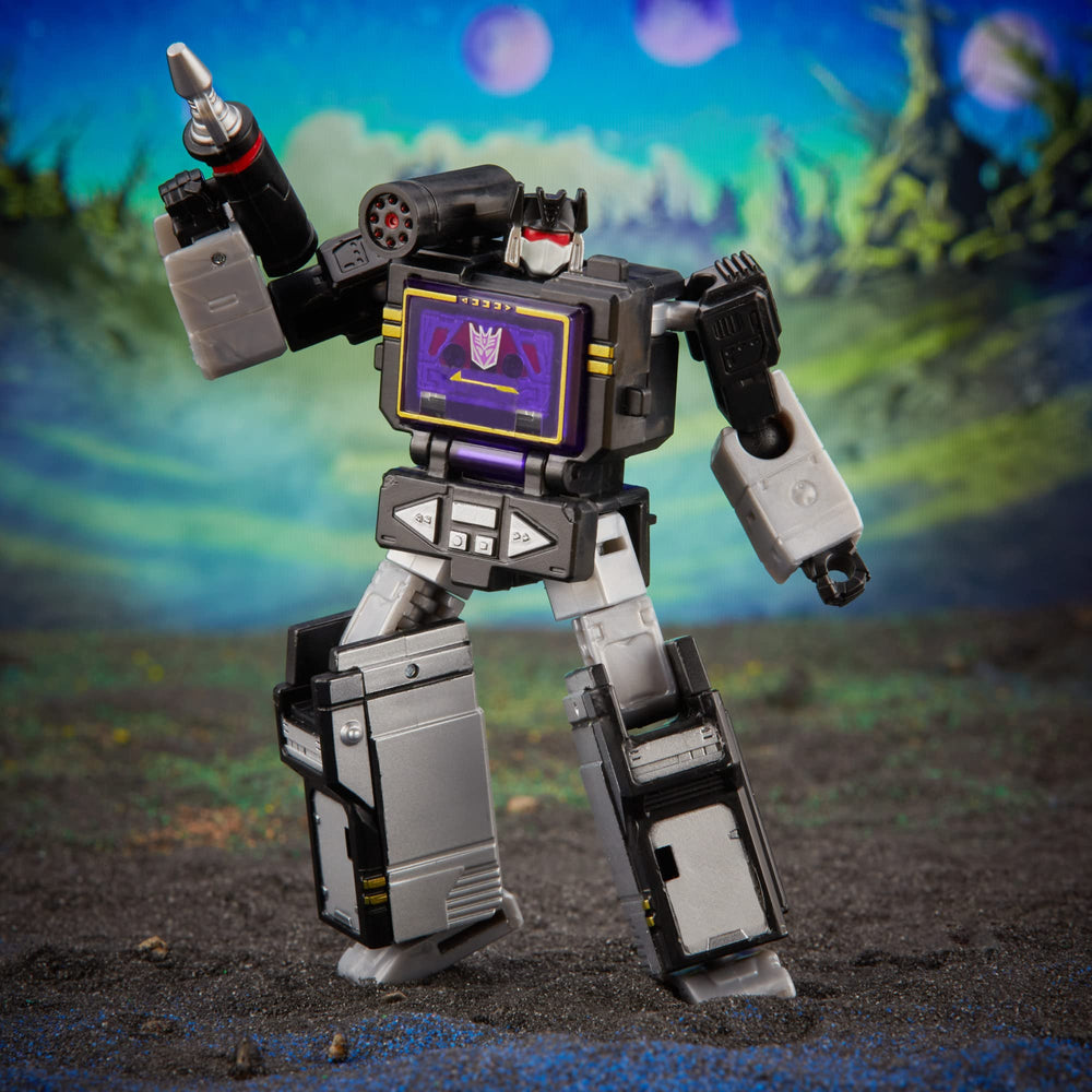 Transformers Soundblaster with shock blaster accessory in attack pose.