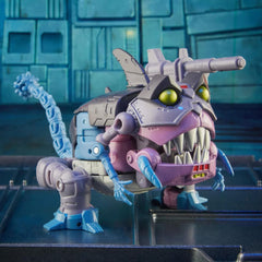 Transformers Gnaw posed beside other figures for dramatic dioramas