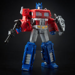 Optimus Prime shown with C.O.M.B.A.T. ports for modular battle setups.