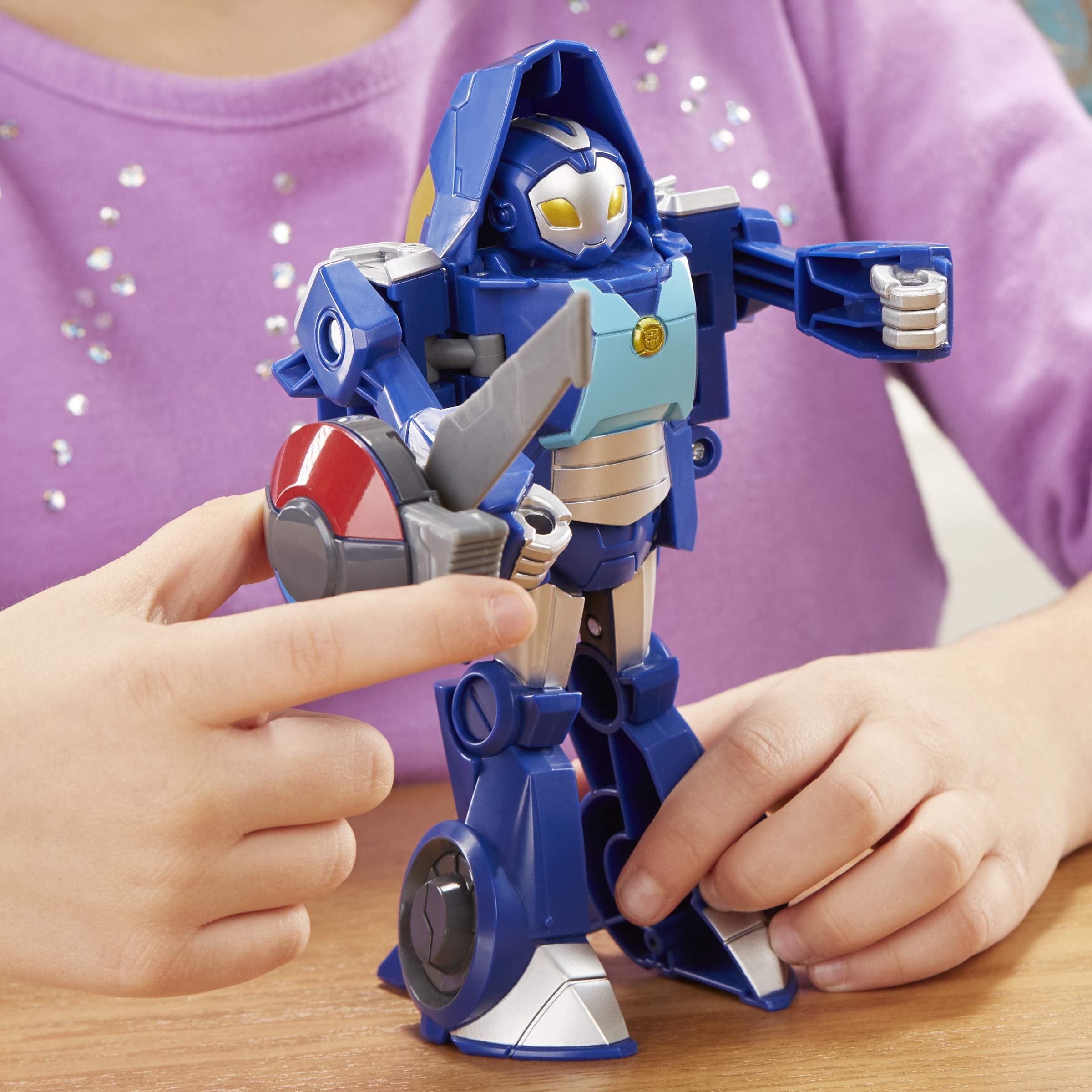 Whirl action pose highlights dynamic pretend-play potential