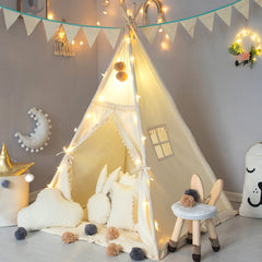 TreeBud Kids Teepee Tent assembled in a cozy playroom for imaginative play