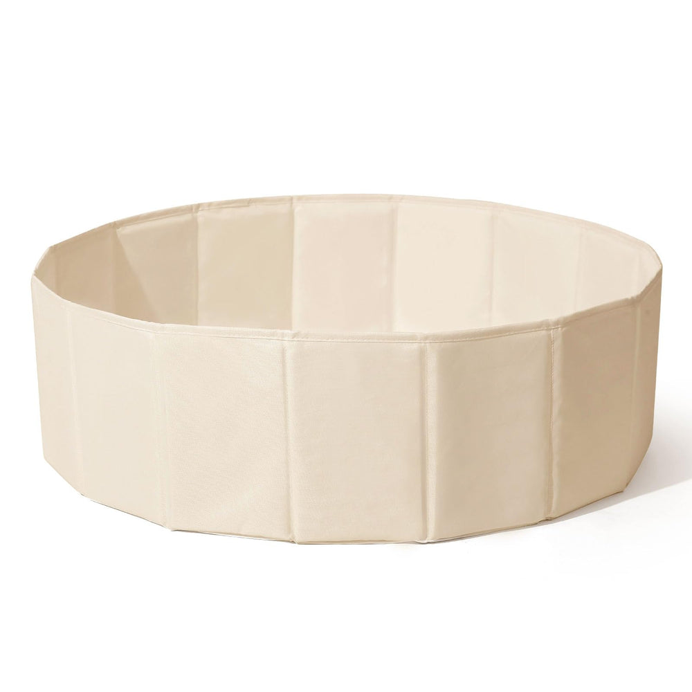 TRENDPLAY beige ball pit keeps play area tidy when stored.