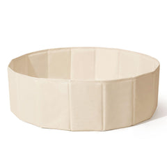 TRENDPLAY beige ball pit keeps play area tidy when stored.