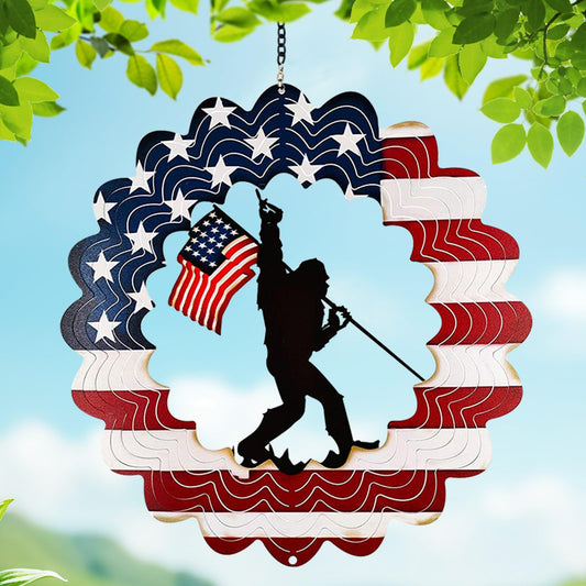 TT & MM Sasquatch wind spinner spins with the American flag for outdoor decor.