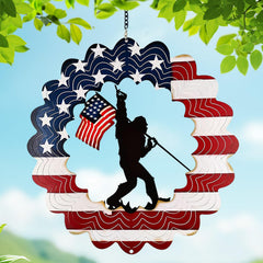 TT & MM Sasquatch wind spinner spins with the American flag for outdoor decor.