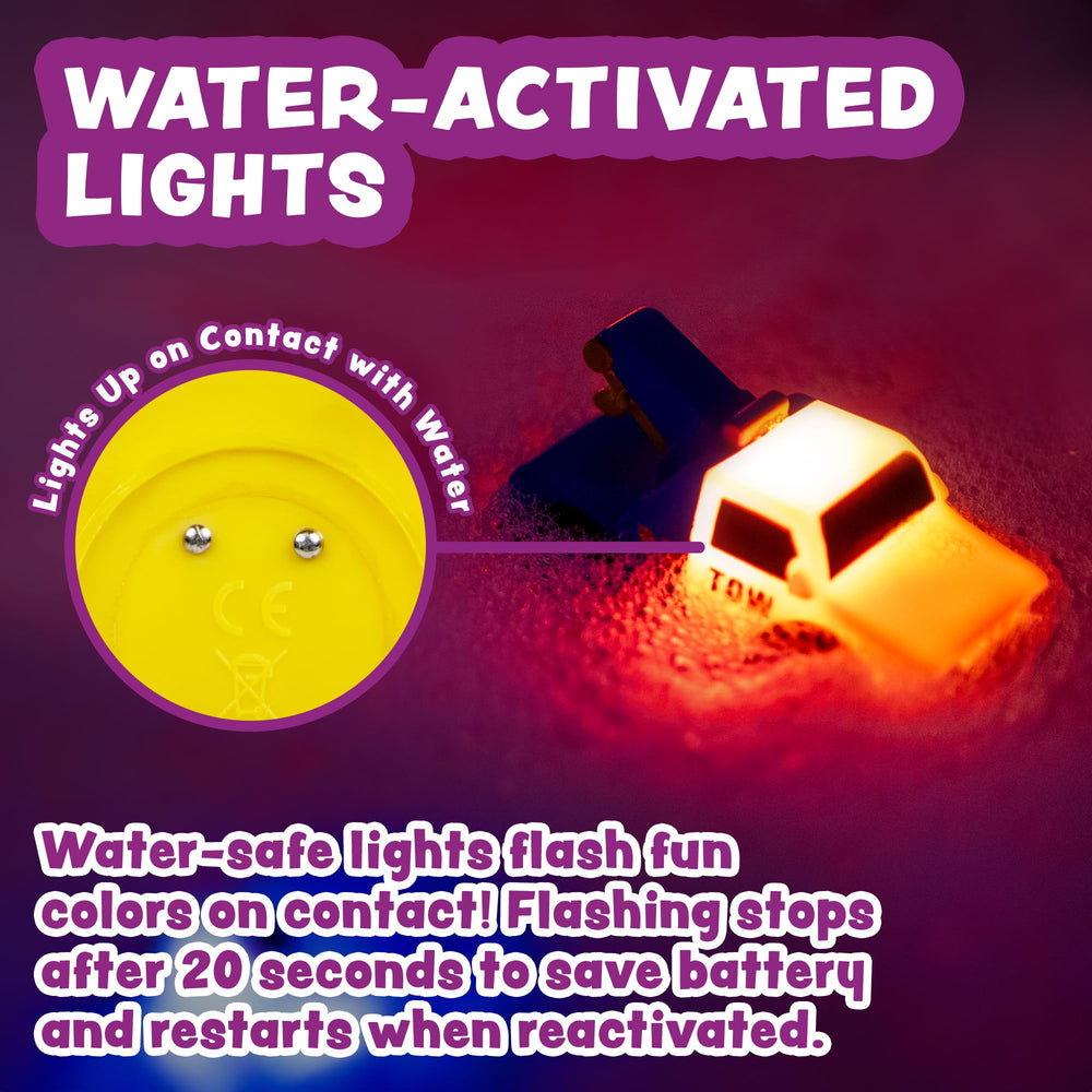 Tub Works Emergency fire engine bath toy with water-activated glow for fascination.