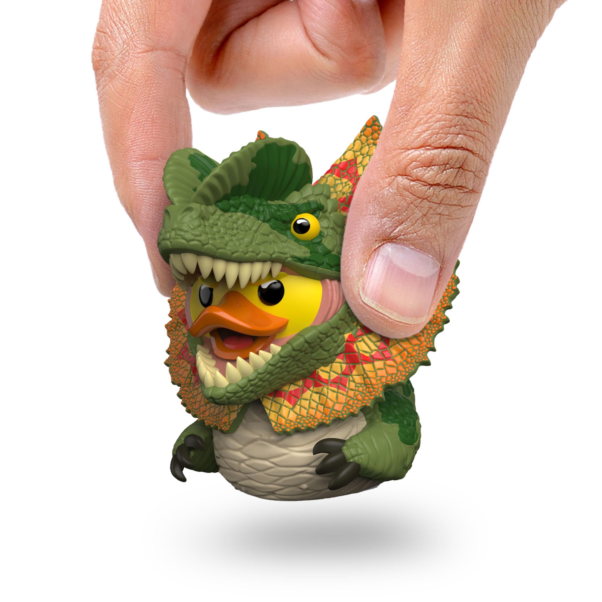 TUBBZ Dilophosaurus cosplaying duck on display shelf adds Jurassic flair.