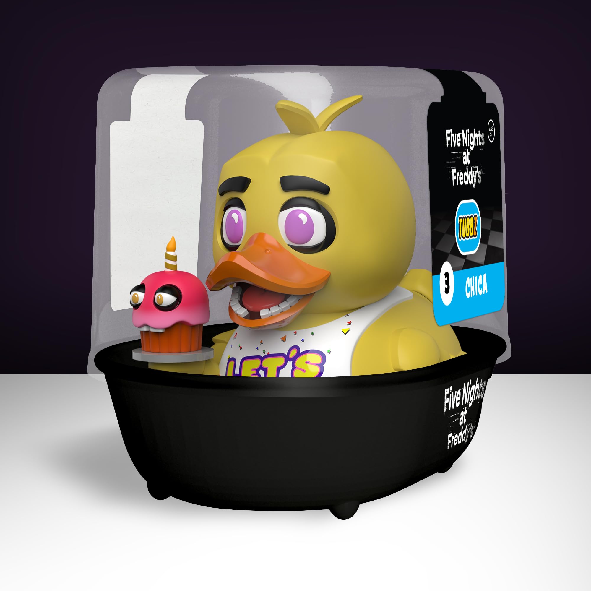 TUBBZ Chica cosplay duck figure on desk provides eye-catching pop culture decor.