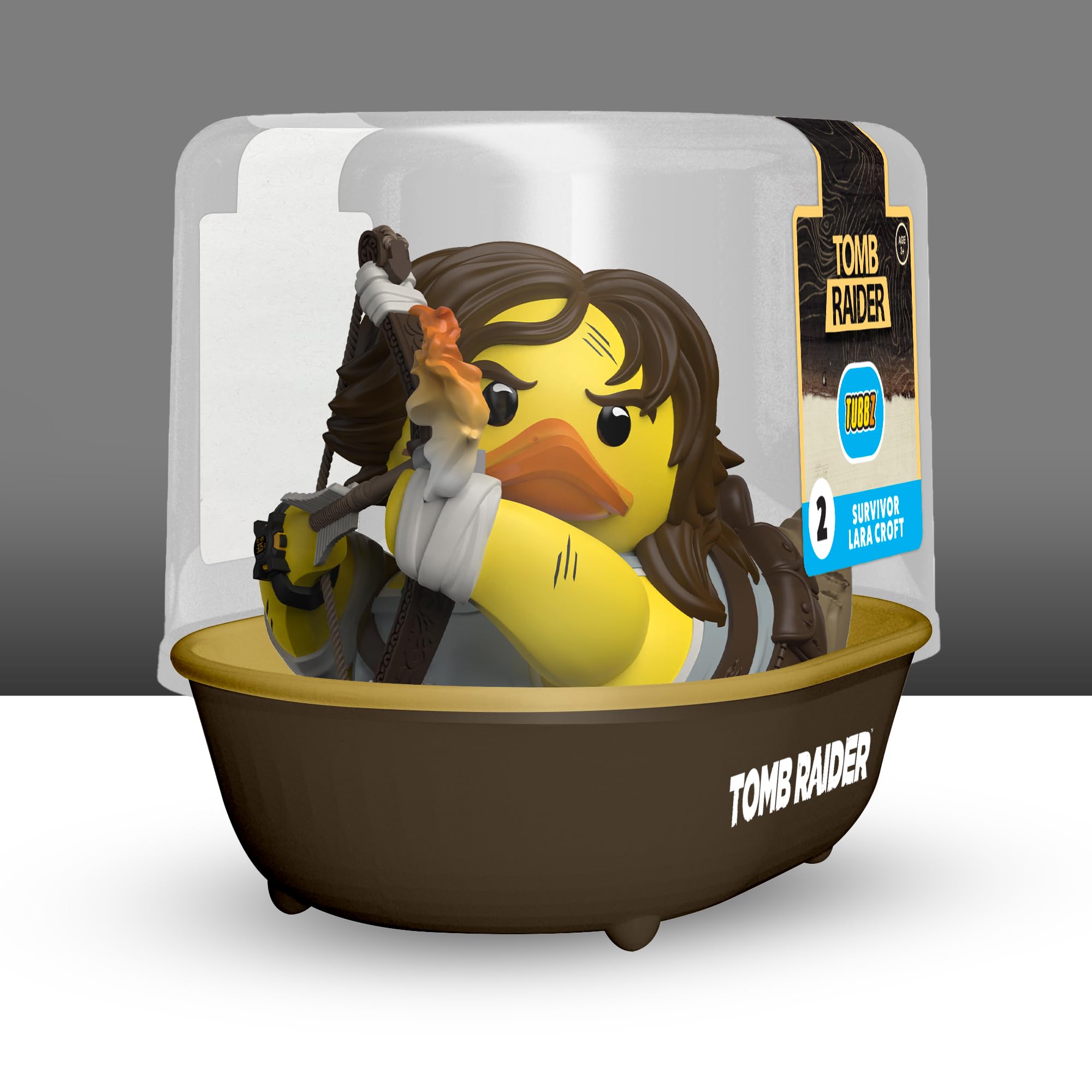 Display-ready TUBBZ Lara Croft duck in a tomb-raider display case.