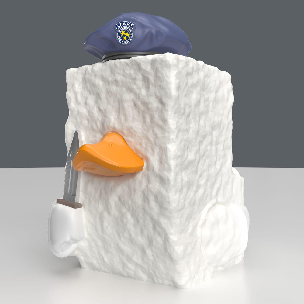 TUBBZ Mini Tofu Duck among cosplaying ducks collection for desk decor.