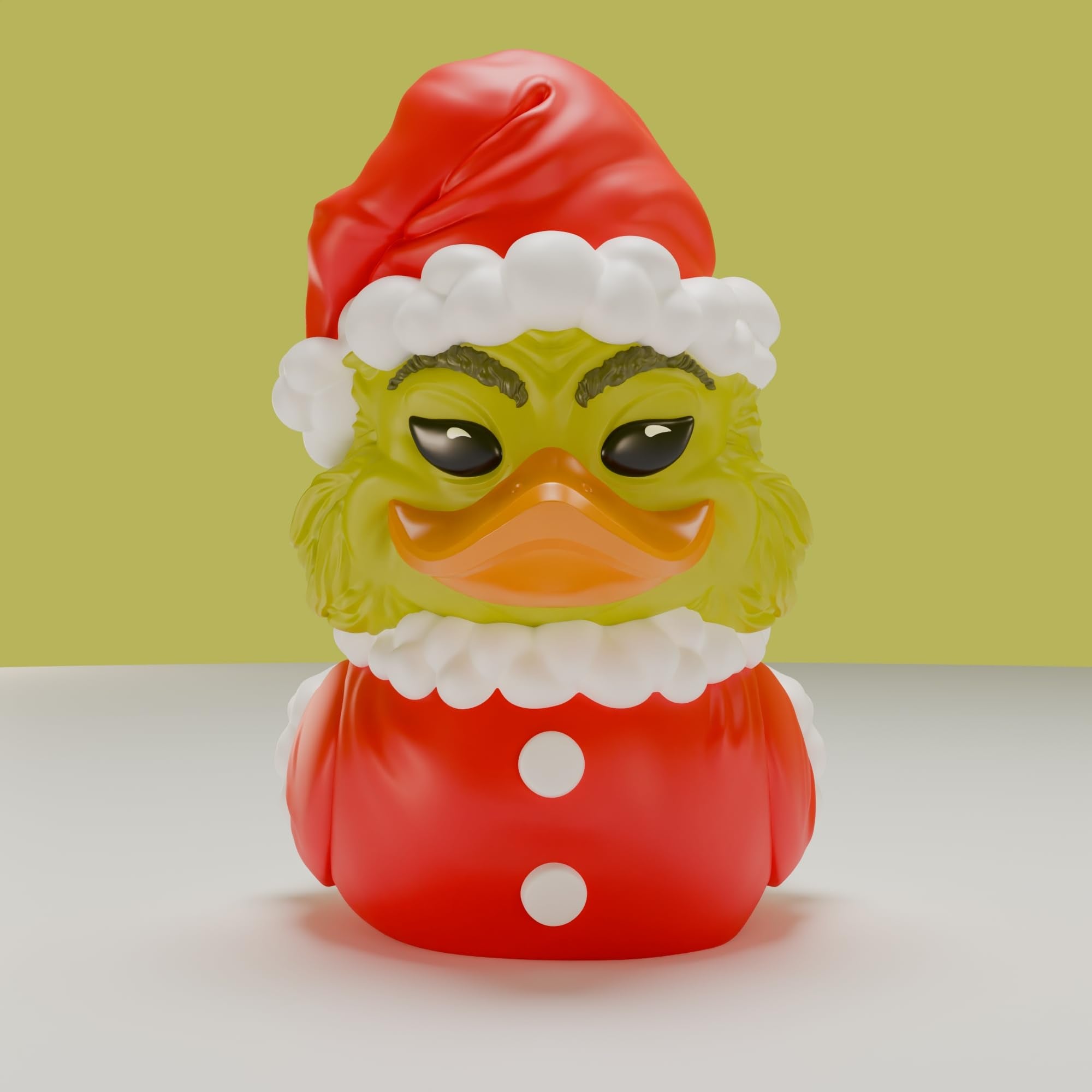 TUBBZ Grinch miniature duck on desk, festive decor and conversation piece.
