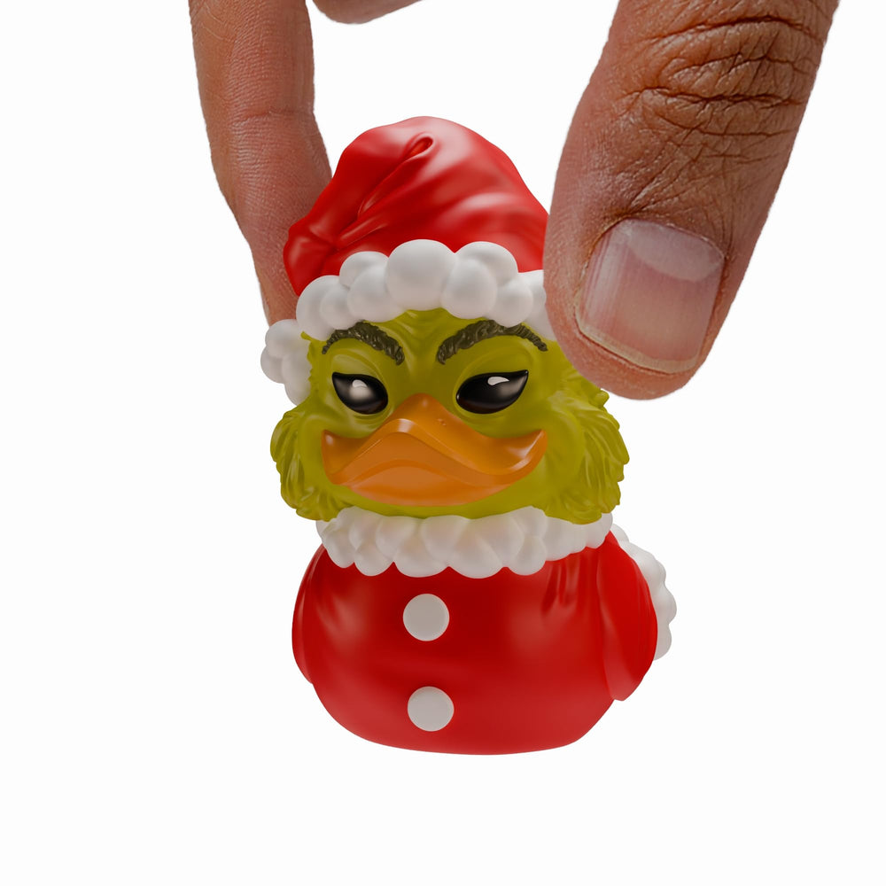 TUBBZ Grinch Mini duck in Santa outfit on mini bathtub display.