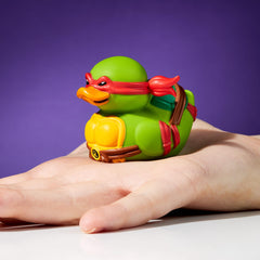 TUBBZ Mini Raphael in a TMNT collection shot with other characters.
