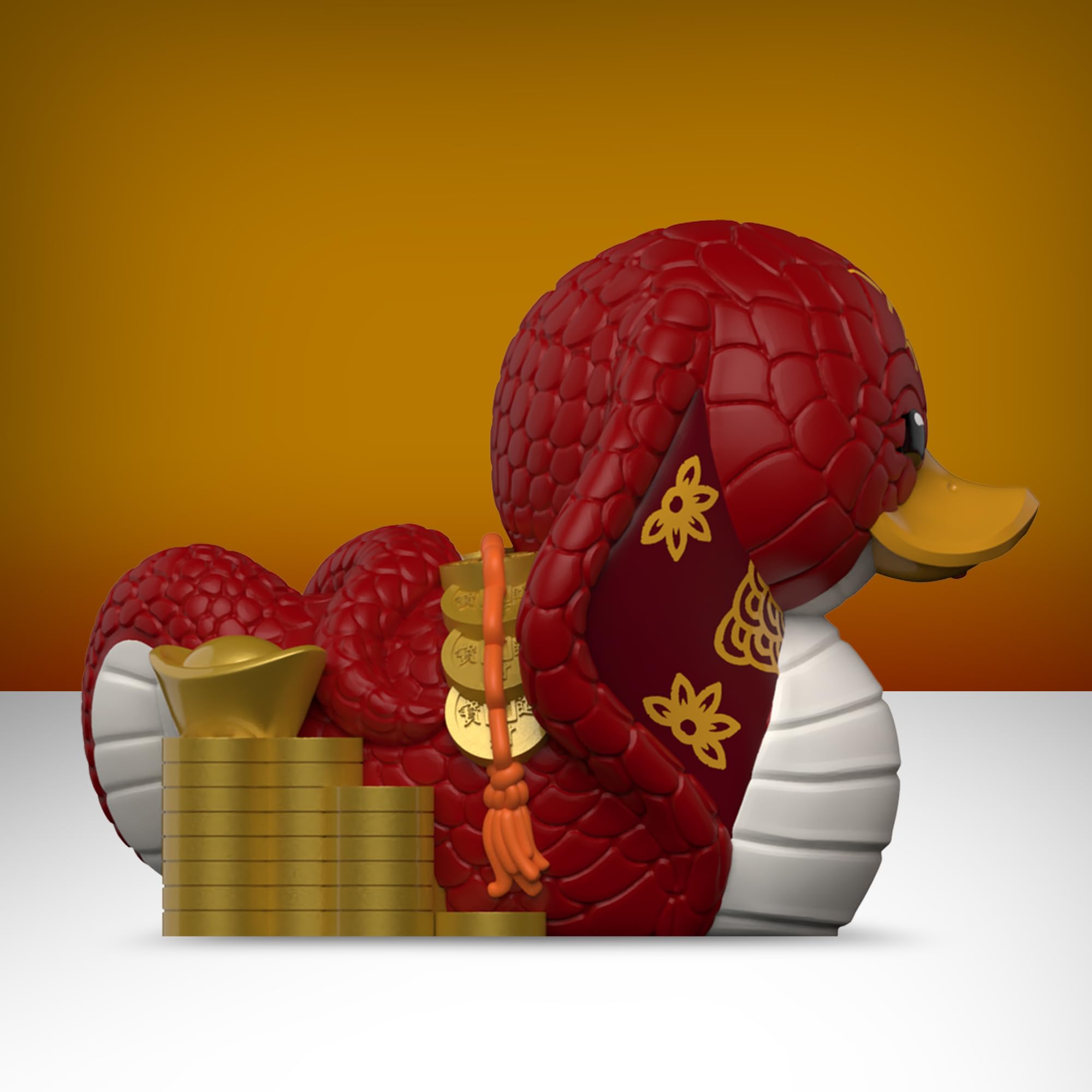 TUBBZ snake duck on desk or dashboard for playful desk decor.