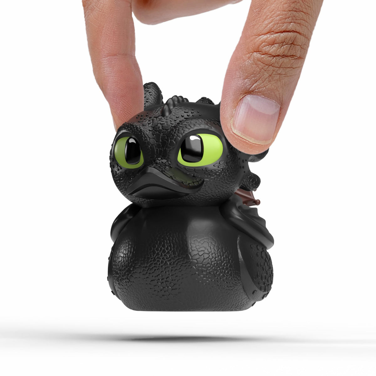 TUBBZ Toothless mini duck in a bathtub display, ideal for shelf decor.