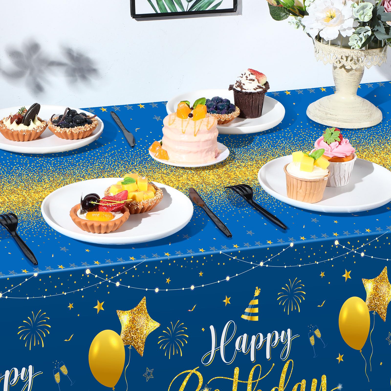 Tudomro blue-gold birthday design tablecloth with cakes and balloons protects surfaces.