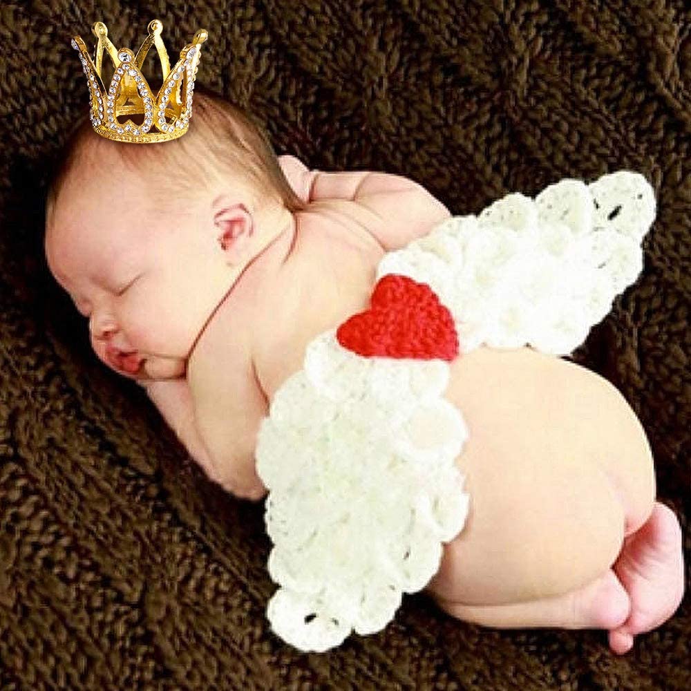TUETOE baby princess crown atop a cake for newborn celebration photos