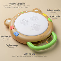 TUMAMA KIDS large button drum toy inviting easy hands-on play for infants.