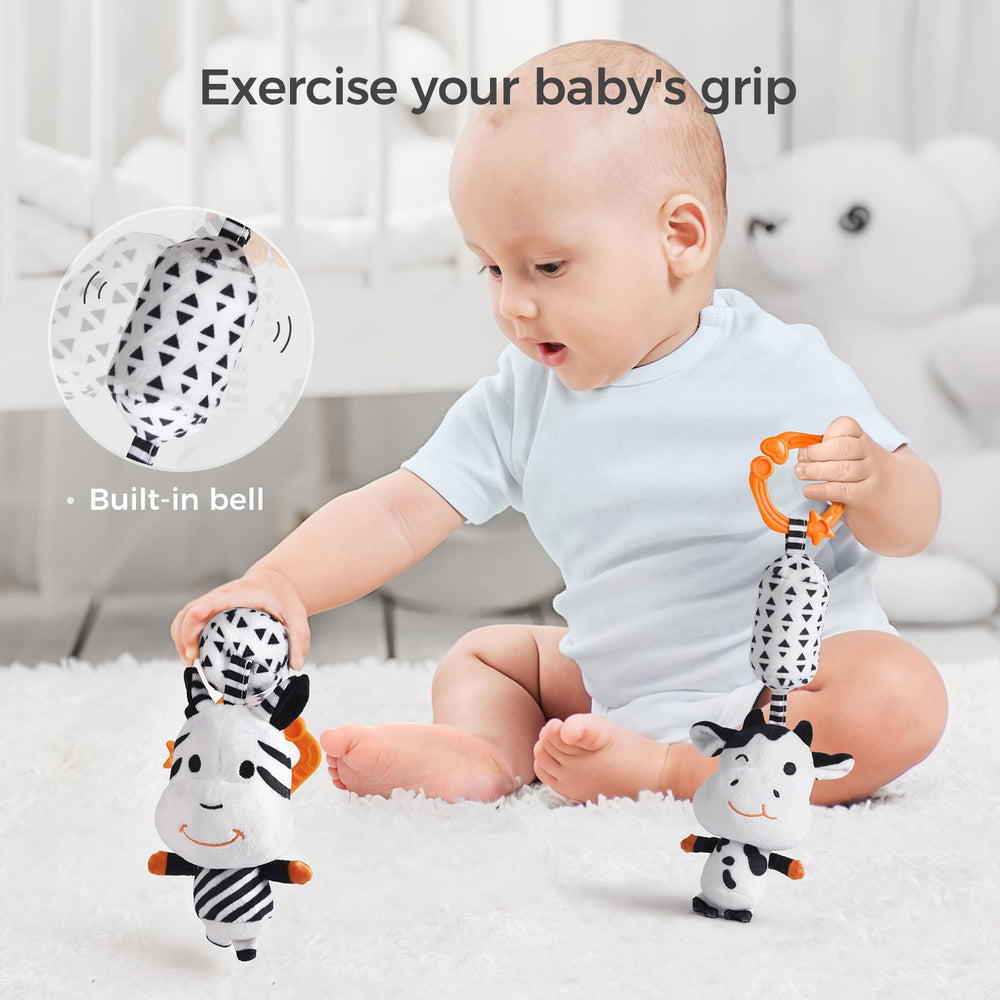 TUMAMA KIDS high contrast clip attaches to stroller for on the go visual play.