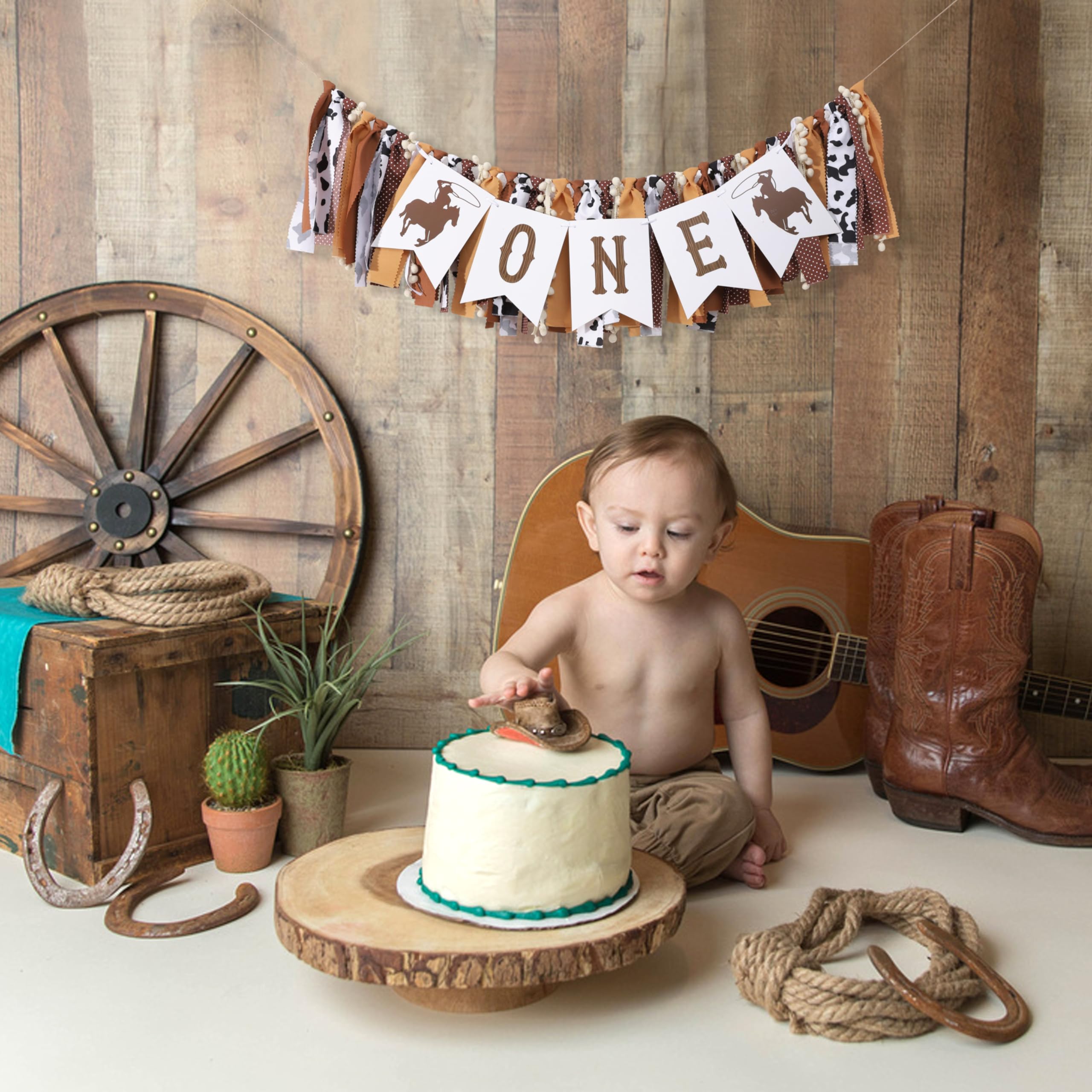 TUTOTU cowboy birthday banner close-up highlights vivid letters and icons.