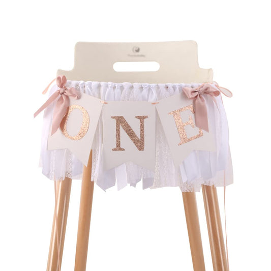 TUTOTU rose gold blush white banner draped over a highchair for a stylish 1st birthday