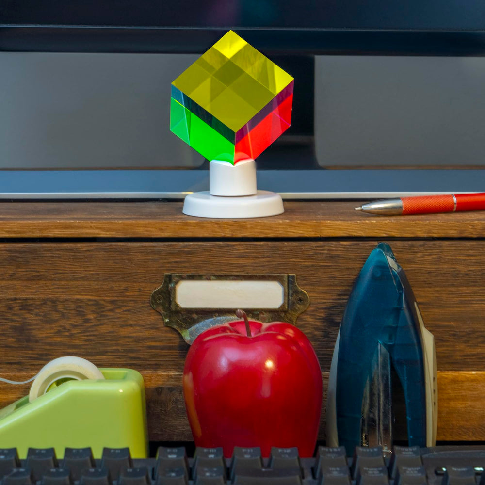Twiddler Toys 2-inch color prism as compact art and focus aid on a desk