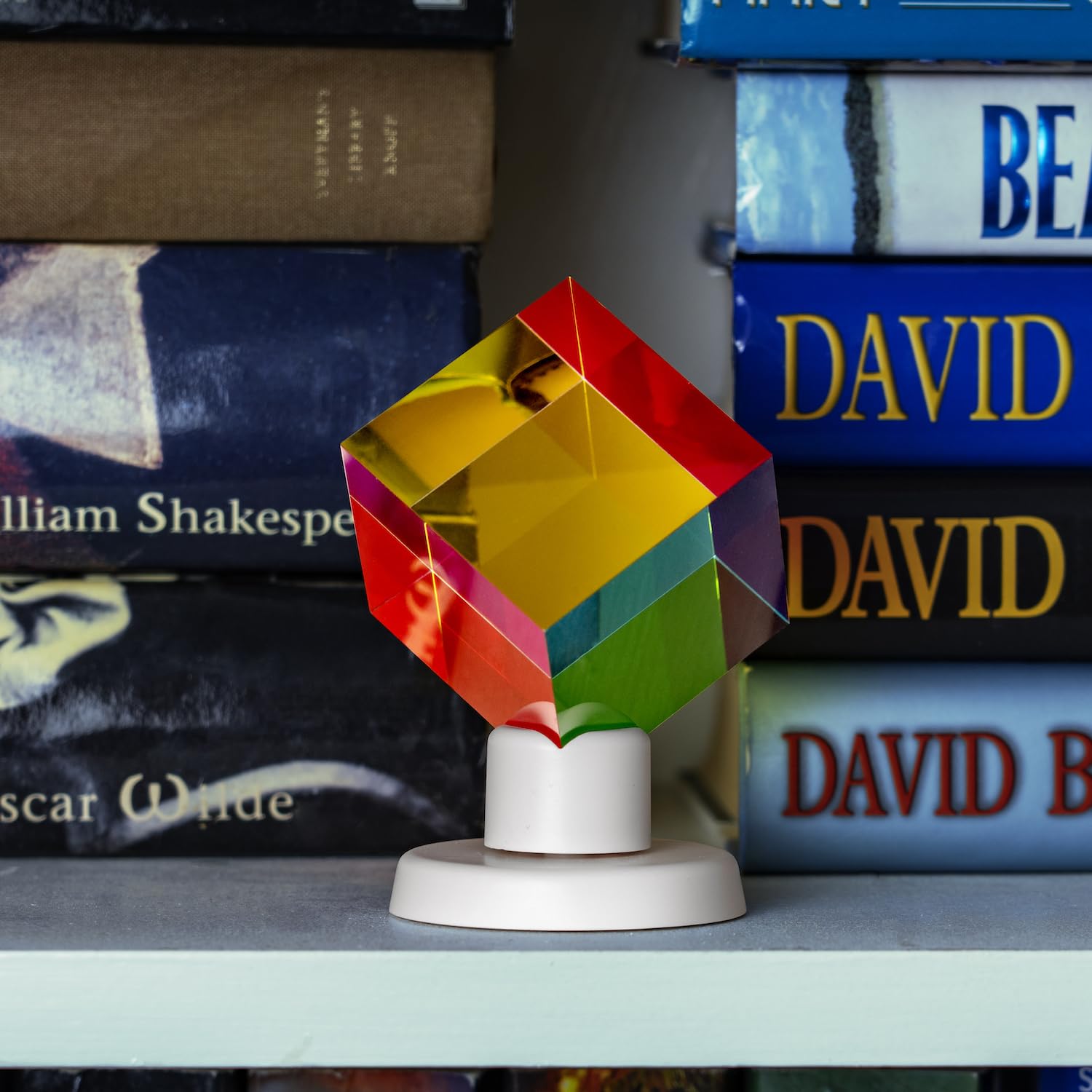 Twiddler Toys cyan-yellow-magenta acrylic prism showing color spectrum for creative exploration