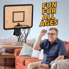 Twiddler Toys clip-on hoop transforms a standard trash bin into a playful game.