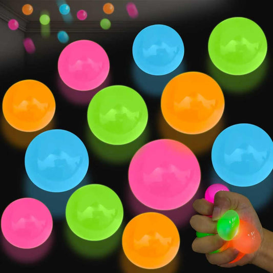 TXP glow sticky ball 2inch in hand showing compact sensory tool