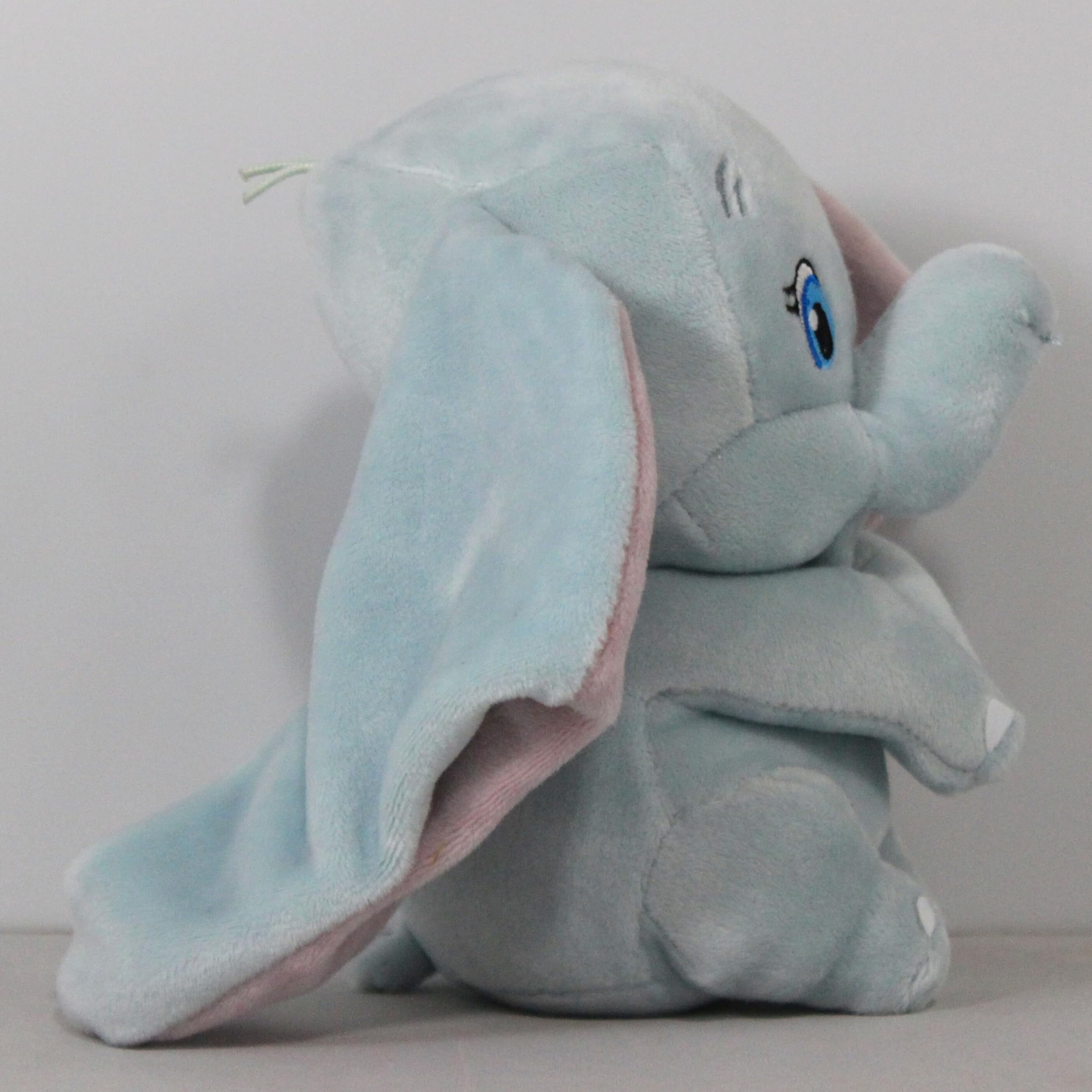 Dumbo small plush close up shows silky soft fabric for comfy hugs.