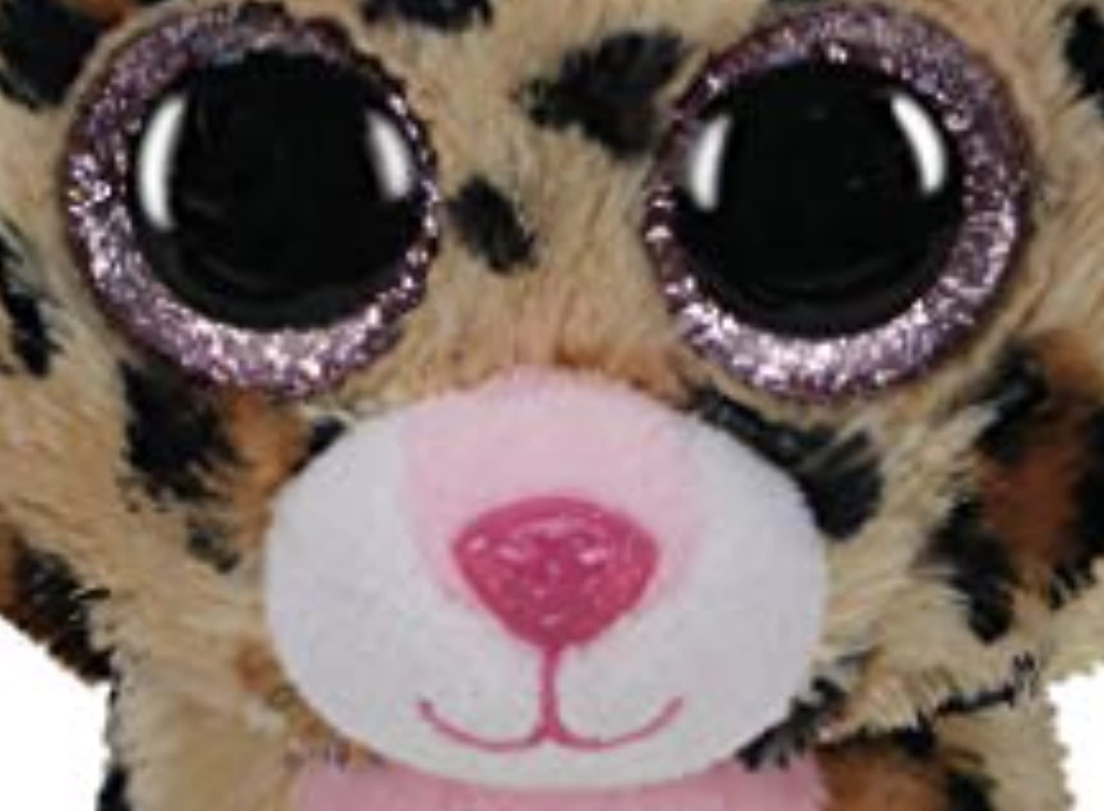 Ty Livvie Leopard Beanie Boo glitter eyes catch light during play.