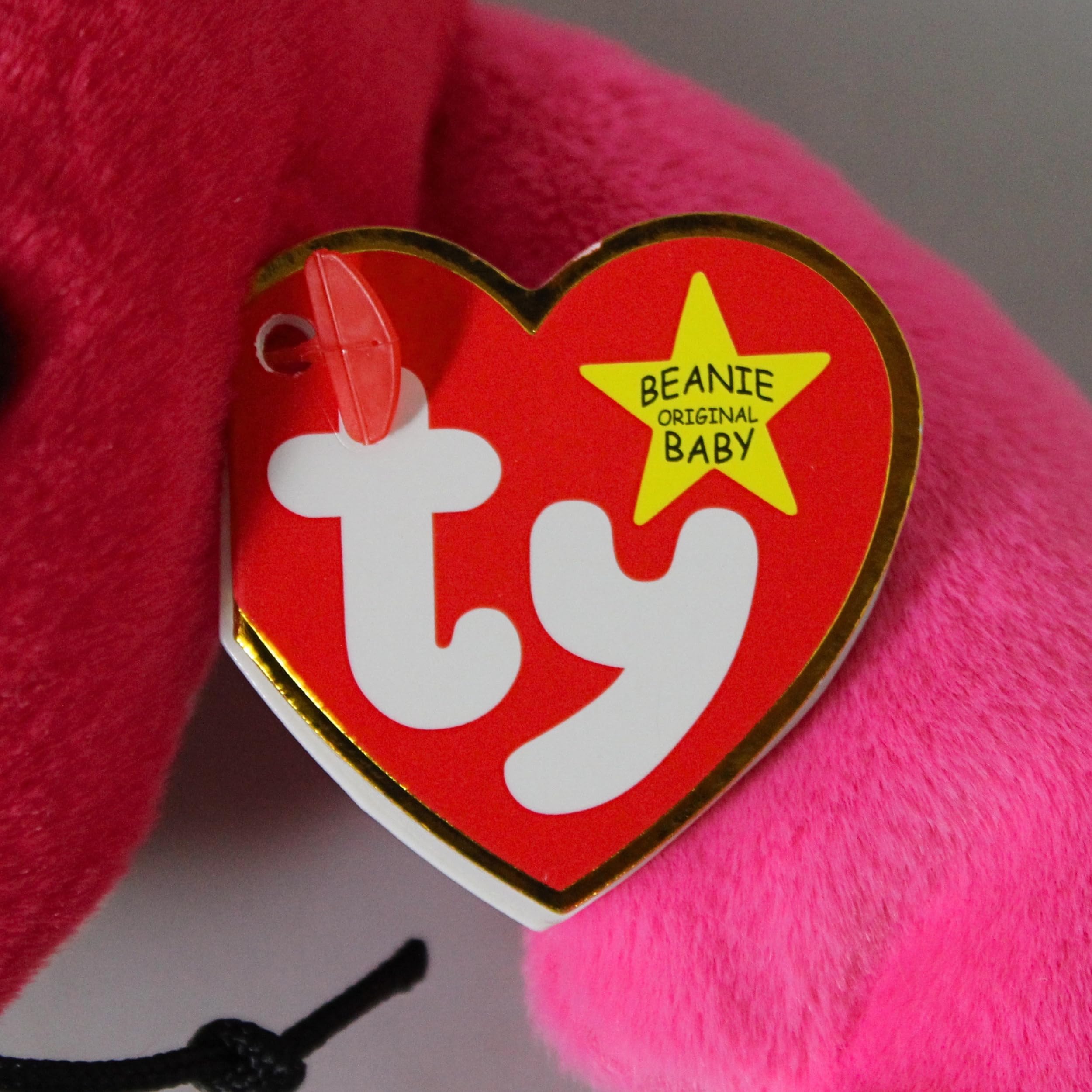 Ty Louie Lobster Beanie Baby side view, a tidy plush for decor.