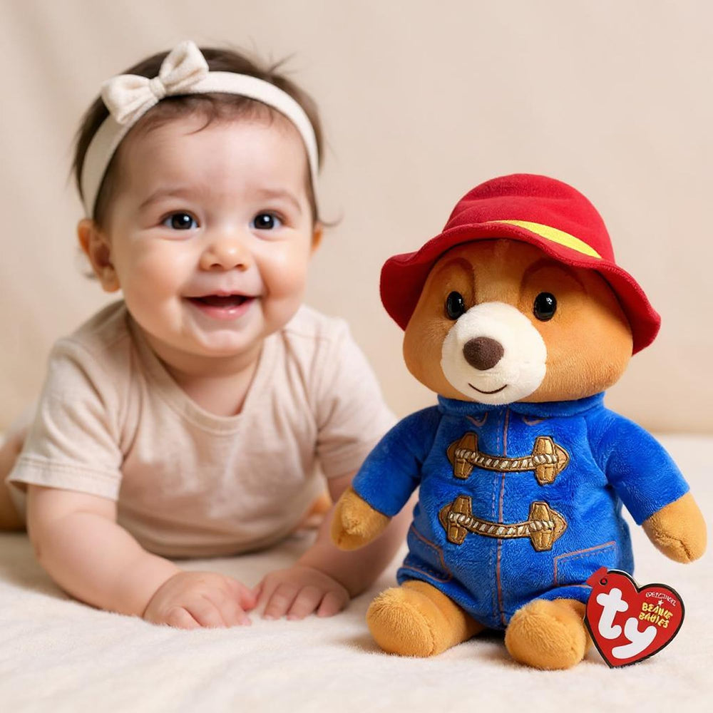 Ty Paddington Beanie Boos regular eyes close-up, adds charm to any shelf.