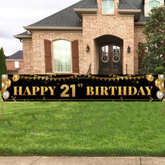 TZSS black and gold happy 21st banner 9.8ft used as a photo backdrop.