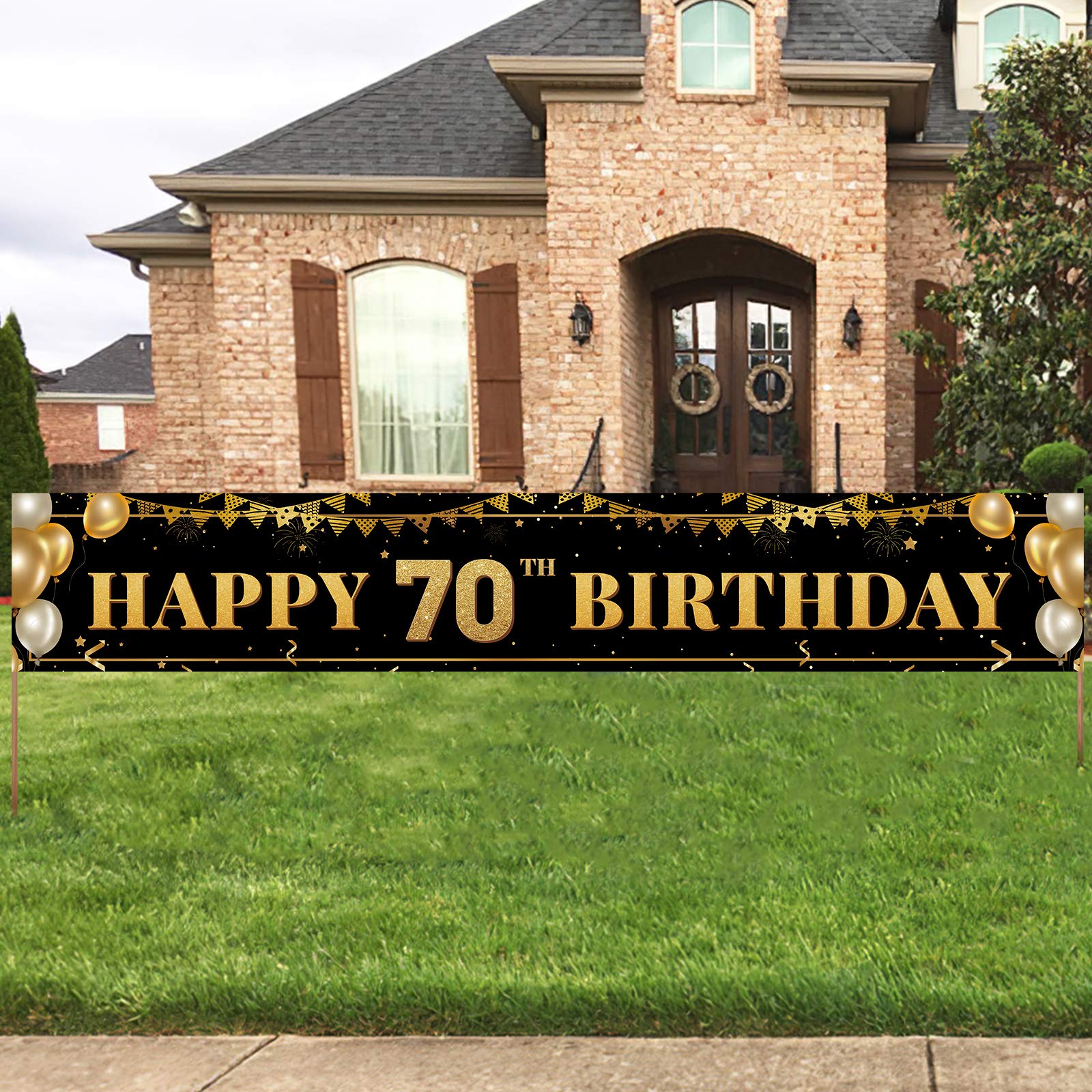 TZSS large black and gold 70th banner, front view, eye-catching birthday backdrop