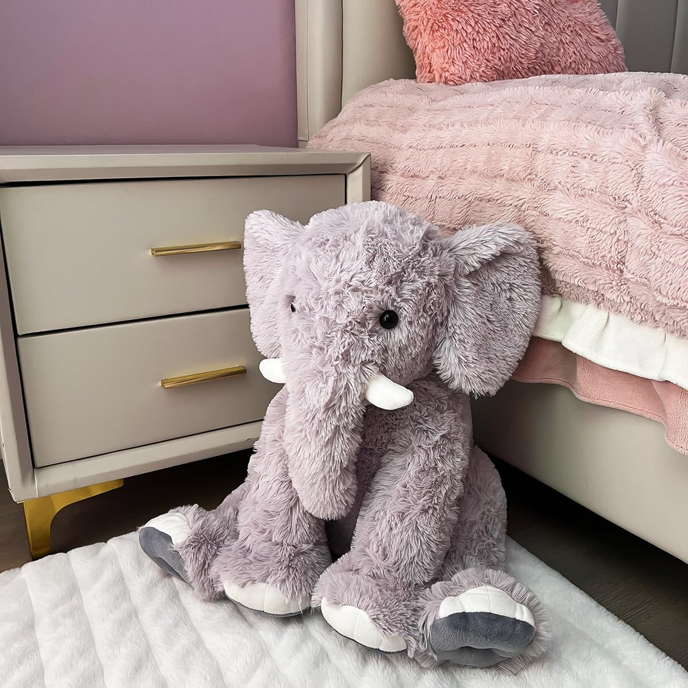 UBABER elephant plush head and face detail inviting gentle hugs and affection.